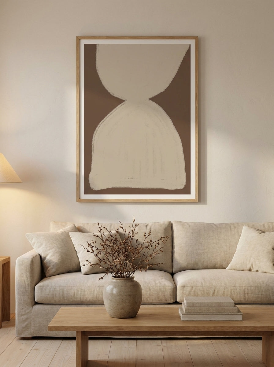 Modern wall art print styled on the wall in a warm Japandi living room