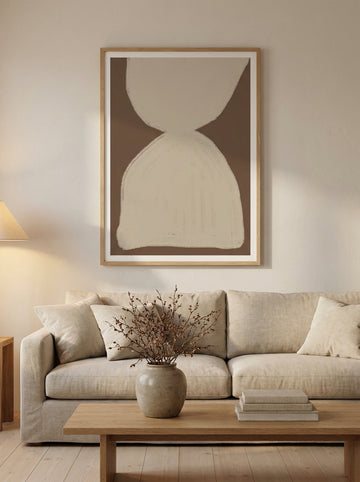 Modern wall art print styled on the wall in a warm Japandi living room