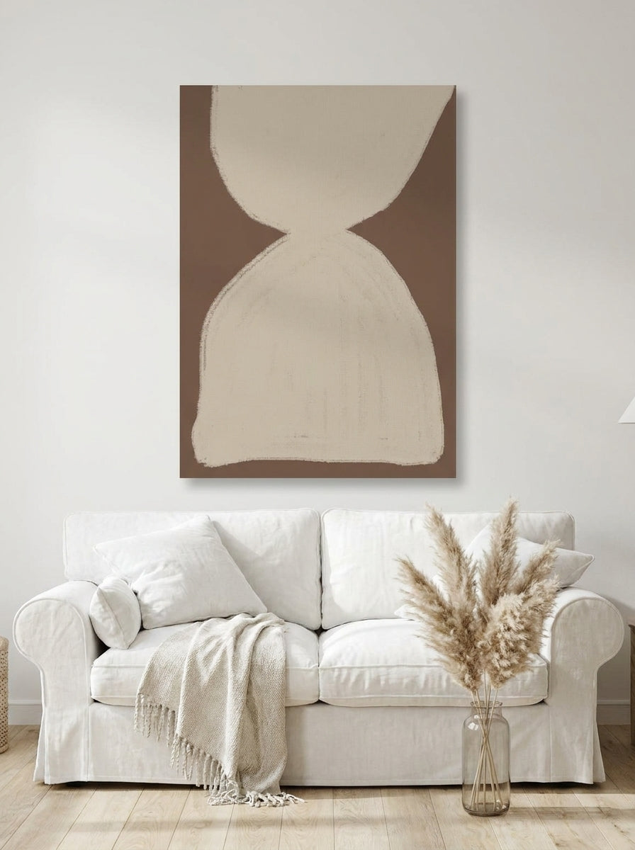 Stretched canvas wall art styled on the wall in a coastal living room