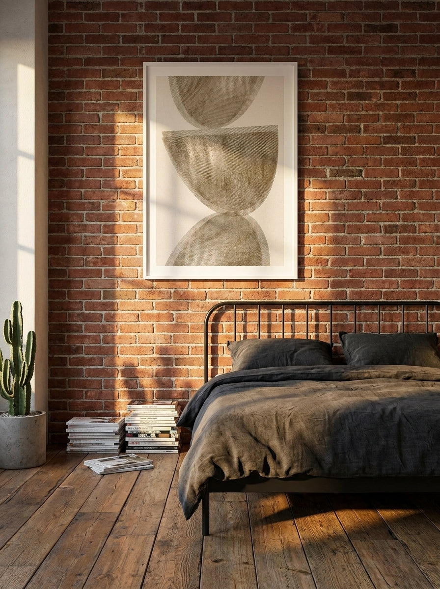 Modern wall art print styled on the wall in an industrial loft bedroom