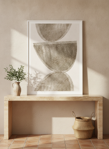 Modern wall art print standing on a console in a Mediterranean home office