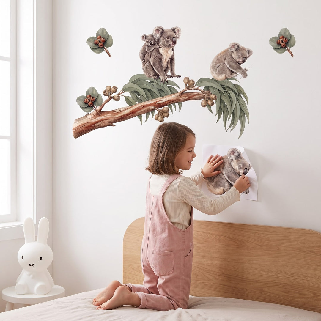 Koala and Gum Tree Wall Sticker Decals wall decals: a girl putting the decals up in a girl's bedroom