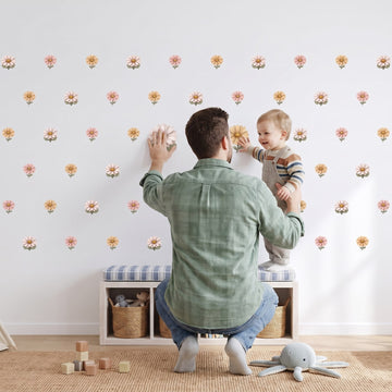 Daisy Meadow Wall Sticker Decals wall decals: a toddler and their dad putting the decals up in a playroom
