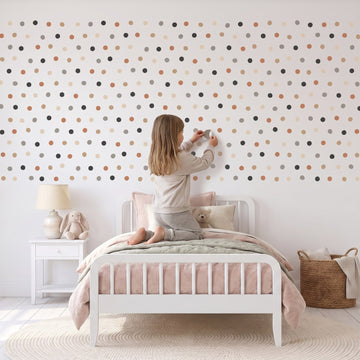 Soft Palette Dots Wall Sticker Decals wall decals: a girl putting the decals up in a girl's bedroom