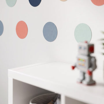 Scattered Dots Wall Sticker Decals wall decals: a close-up of the decals from one side in a kids' room