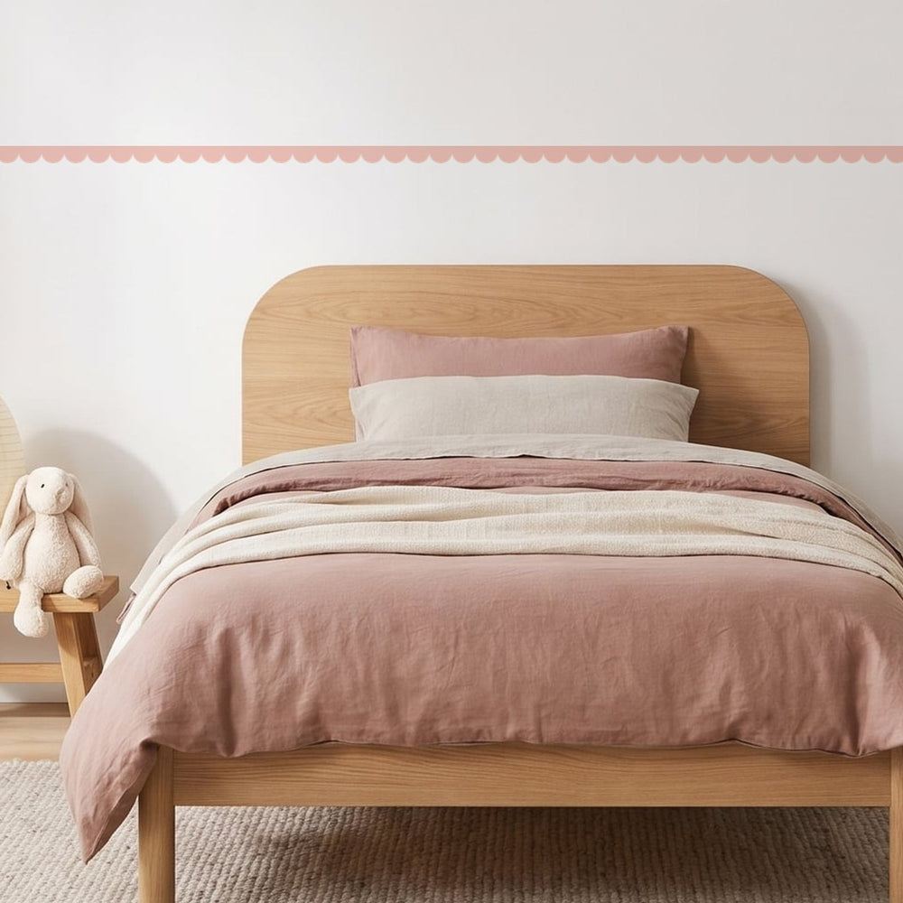 Scallop Border Panels Wall Sticker Decals running across a girl's bedroom wall (in Blush)