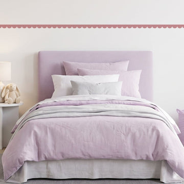 Scallop Border Panels Wall Sticker Decals running across a girl's bedroom wall (in Dusty Rose)