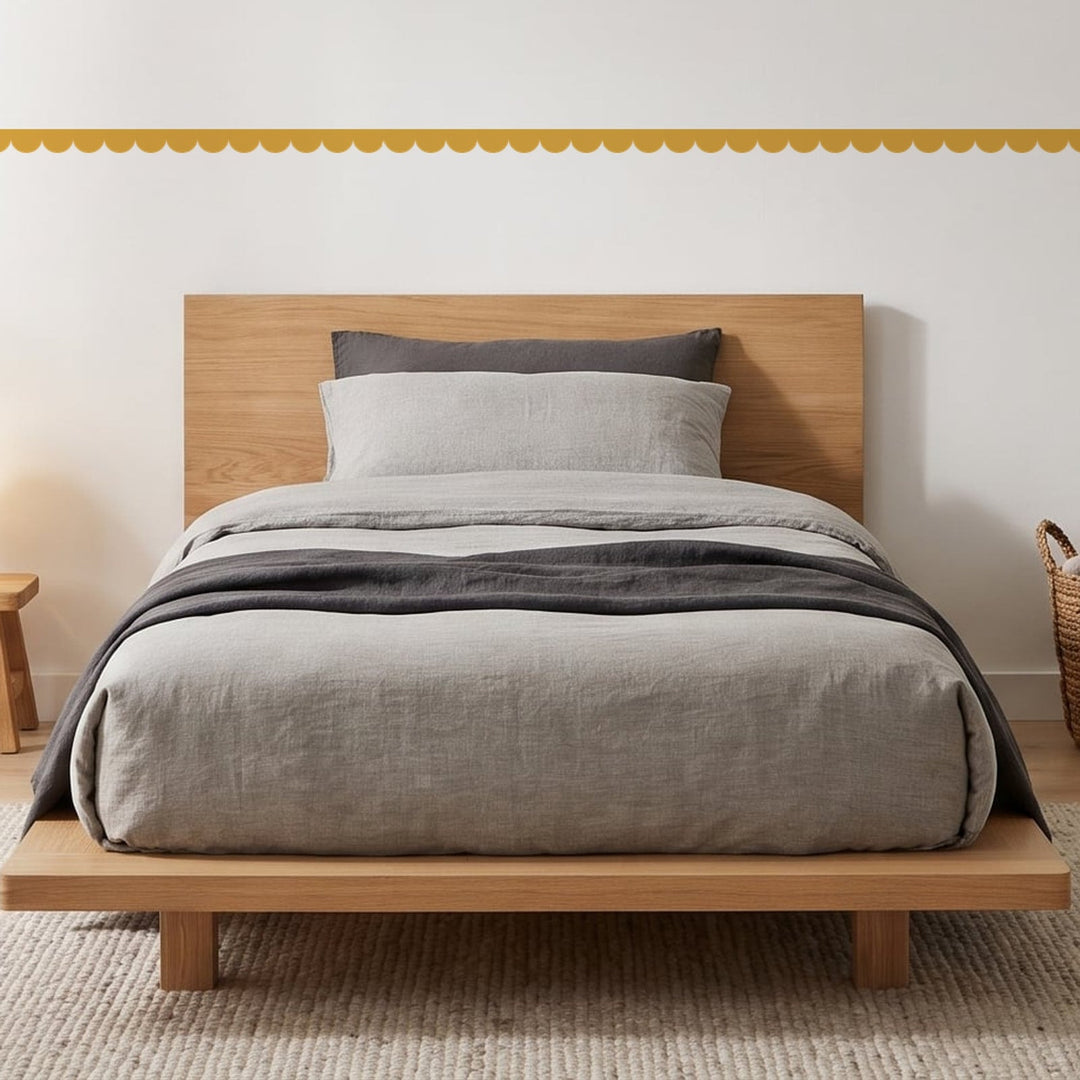 Scallop Border Panels Wall Sticker Decals running across a boy's bedroom wall (in Mustard)