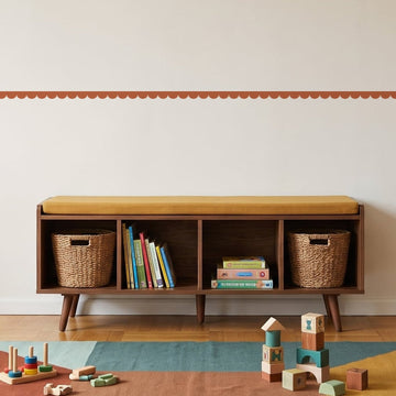 Scallop Border Panels Wall Sticker Decals running across a playroom wall (in Terracotta)
