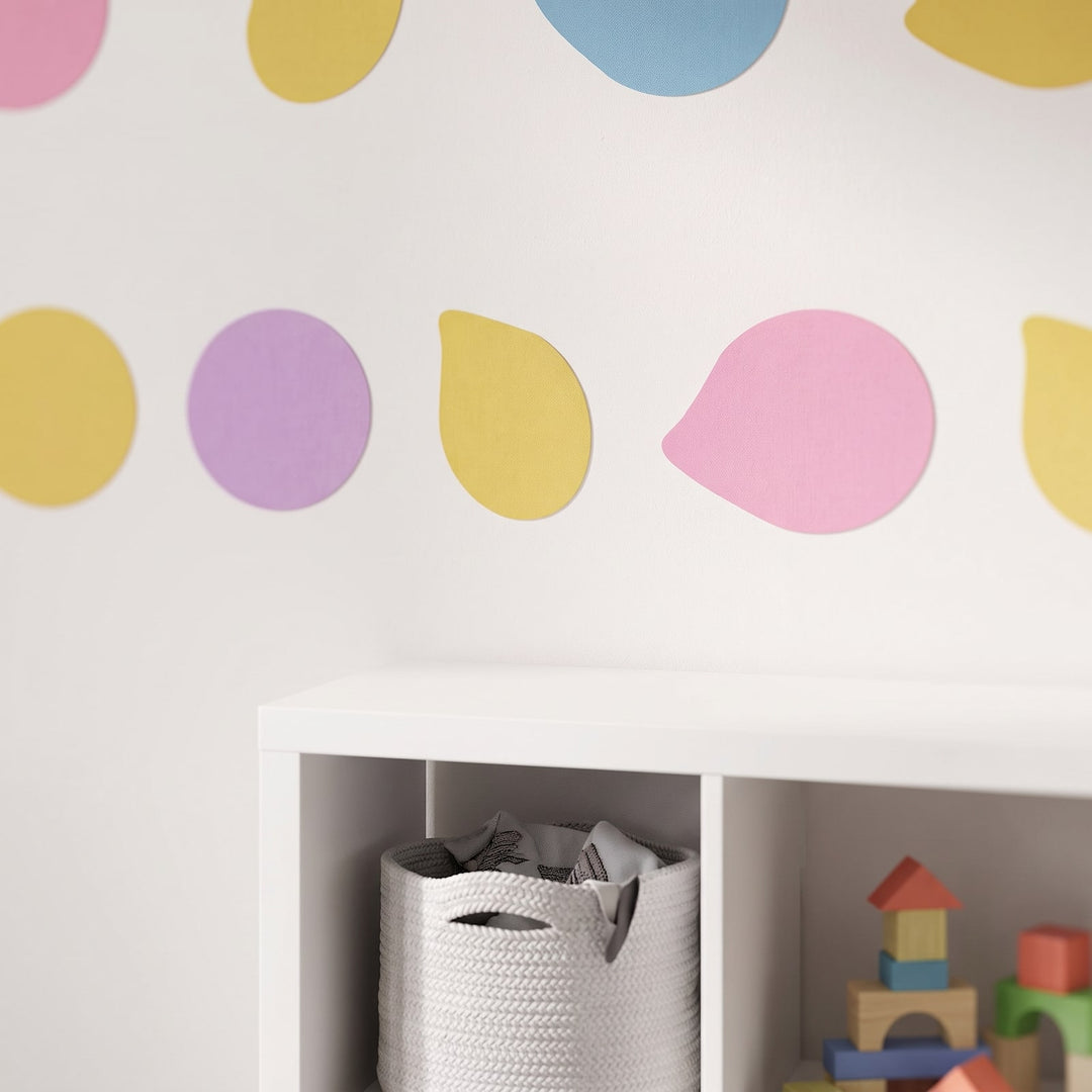 Pastel Pebble Dots Wall Sticker Decals wall decals: a close-up of the decals from one side in a kids' room