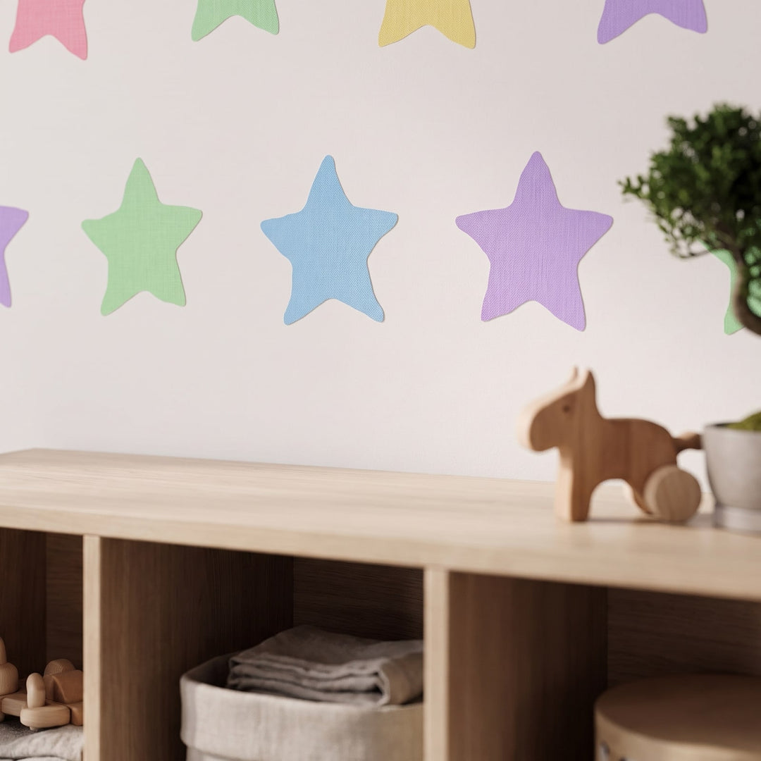 Pastel Star Shower Wall Sticker Decals wall decals: a close-up of the decals from one side in a kids' room