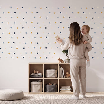Little Dreamer Stars Wall Sticker Decals wall decals: a toddler and their mum putting the decals up in a kids' room