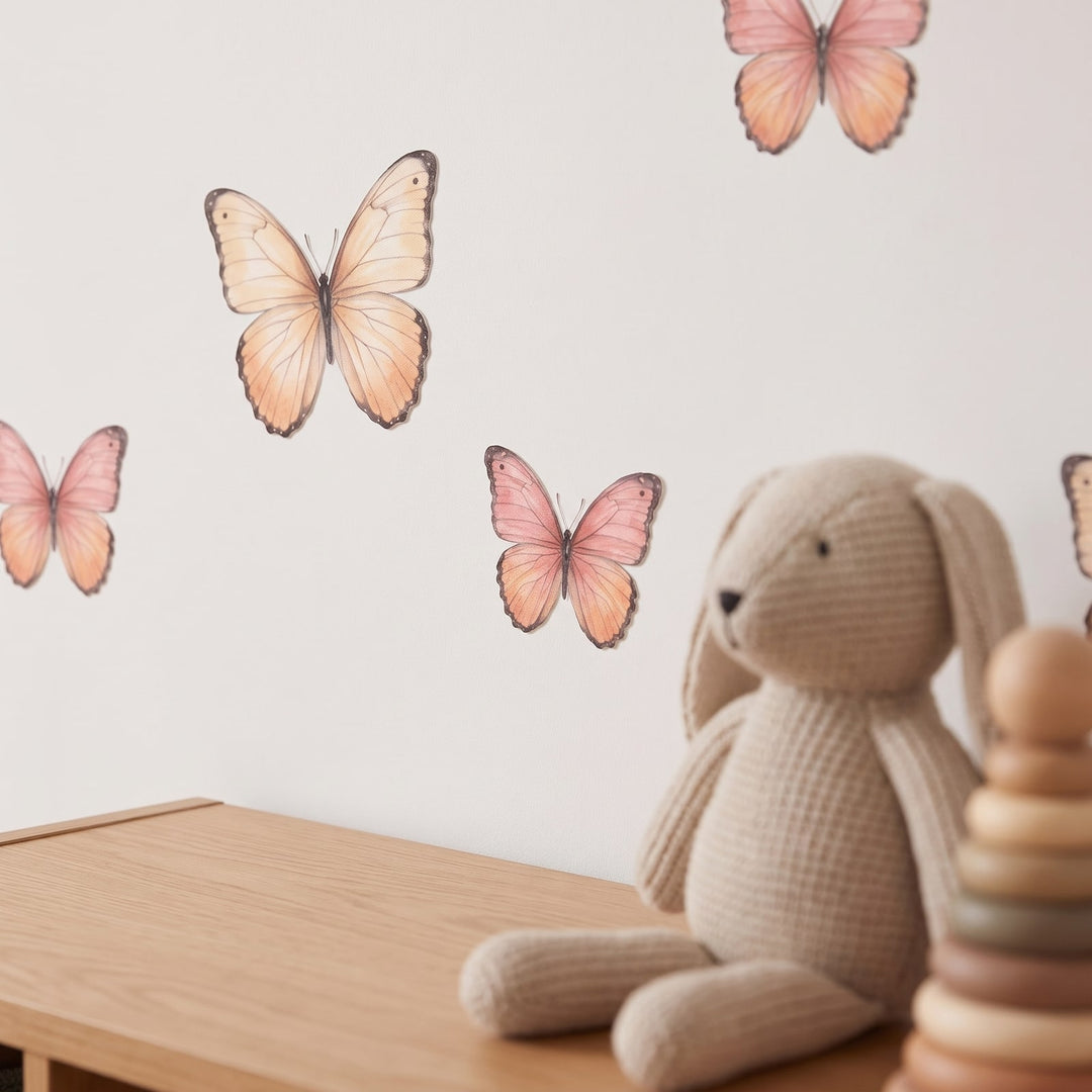 Blush Watercolour Butterflies Wall Sticker Decals wall decals: a close-up of the decals from one side in a kids' room