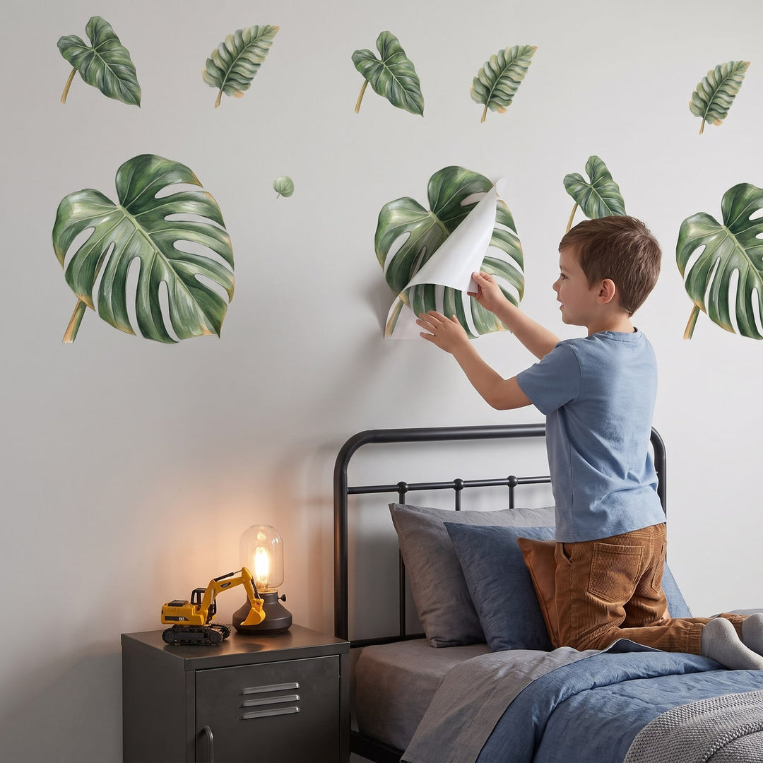Tropical Jungle Leaves Wall Sticker Decals wall decals: a boy putting the decals up in a boy's bedroom