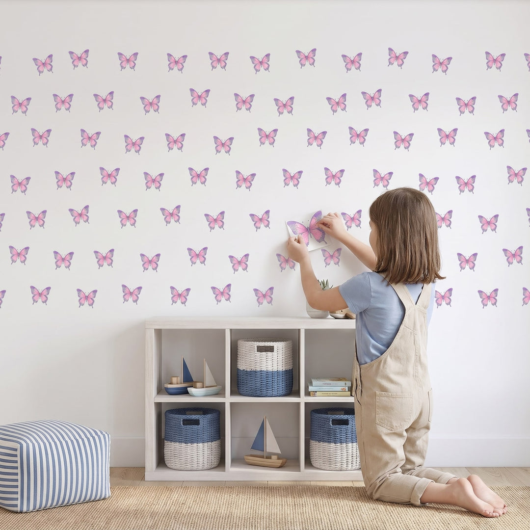 Butterfly Garden Wall Sticker Decals wall decals: a girl putting the decals up in a kids' room