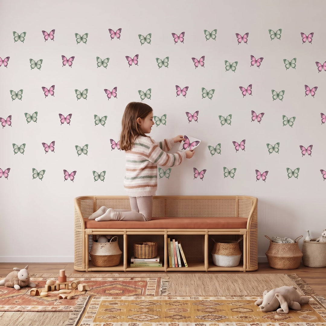 Sage and Blush Butterflies Wall Sticker Decals wall decals: a girl putting the decals up in a playroom