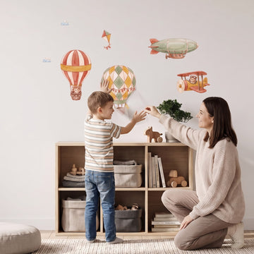 Patchwork Balloon Skies Wall Sticker Decals wall decals: a boy and his mum putting the decals up in a kids' room