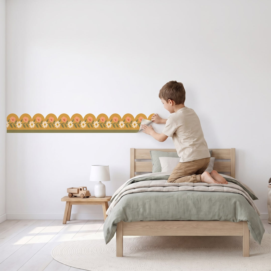 Retro Daisy Scallop Border Wall Sticker Decals wall decals: a boy putting the decals up in a boy's bedroom
