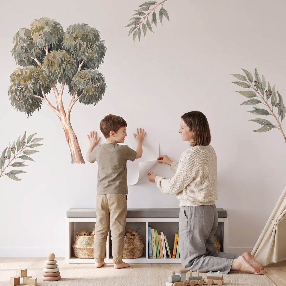 Ghost Gum Tree Wall Sticker Decals wall decals: a boy and his mum putting the decals up in a playroom