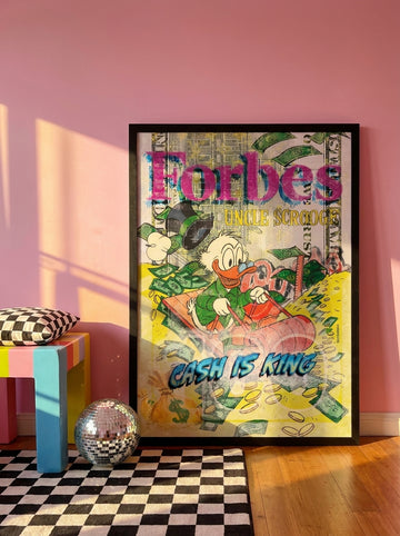 Oversized statement modern wall art print leaning against the wall in a colourful eclectic living room