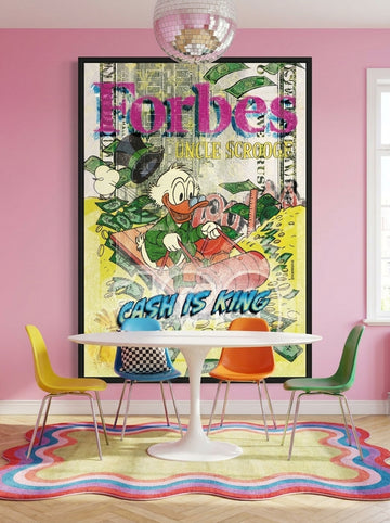 Canvas wall art with a black surround styled on the wall in a colourful eclectic dining room