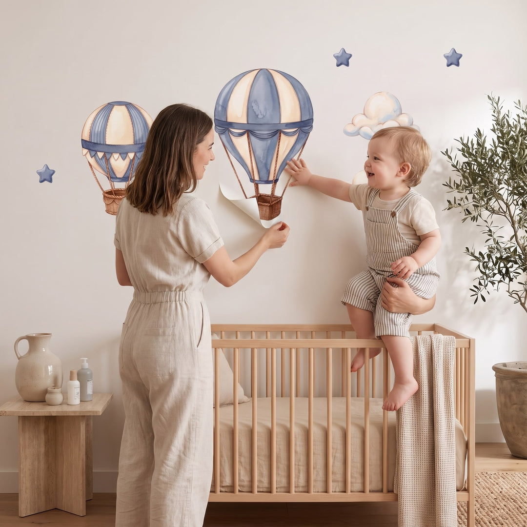 Dusty Blue Hot Air Balloons Wall Sticker Decals wall decals: a toddler and their mum putting the decals up in a nursery