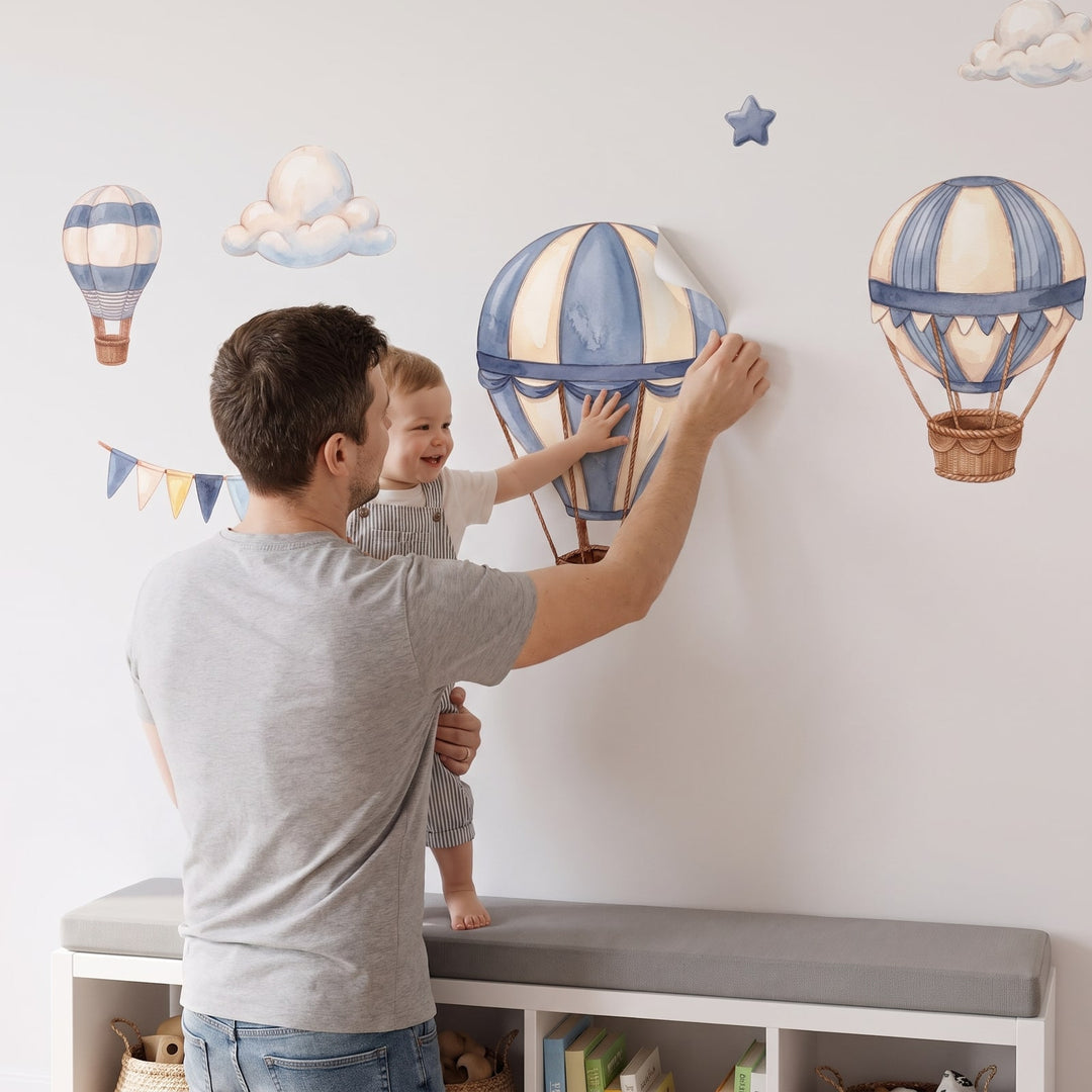 Dusty Blue Hot Air Balloons Wall Sticker Decals wall decals: a toddler and their dad putting the decals up in a playroom