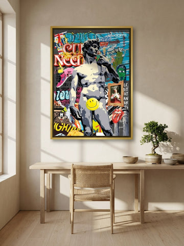 Oversized statement canvas wall art with a gold leaf surround styled on the wall in a warm Japandi home office