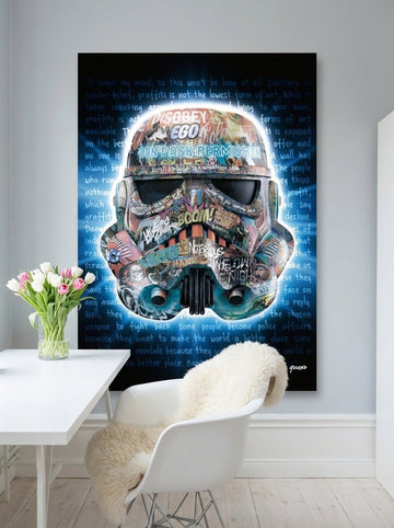 Stretched canvas wall art styled on the wall in a bright Scandinavian home office