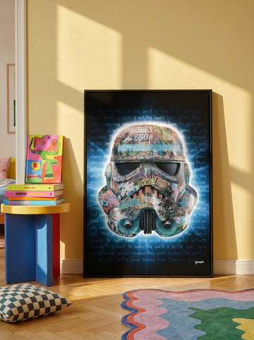 Oversized statement canvas wall art with a black surround leaning against the wall in a colourful eclectic bedroom