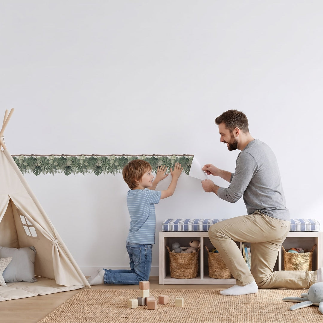 Monstera Vine Trim Wall Sticker Decals wall decals: a boy and his dad putting the decals up in a playroom