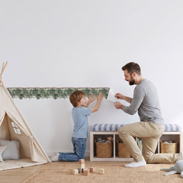 Monstera Vine Trim Wall Sticker Decals wall decals: a boy and his dad putting the decals up in a playroom