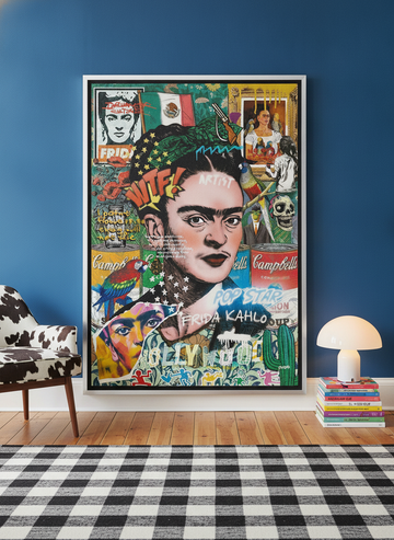 Oversized statement canvas wall art with a silver leaf surround leaning against the wall in a colourful eclectic dining room