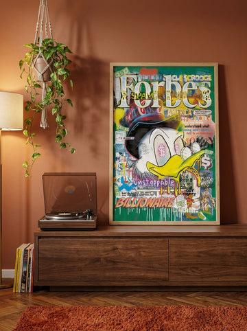 Modern wall art print standing on a sideboard in a retro 70s home office