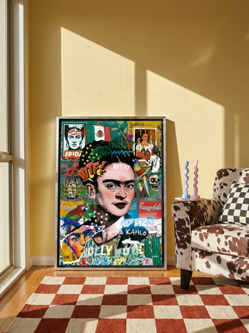 Canvas wall art with a silver leaf surround leaning against the wall in a colourful eclectic bedroom