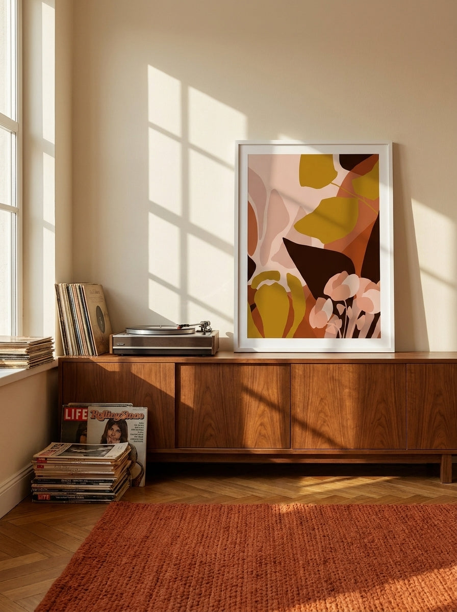 Modern wall art print standing on a sideboard in a retro 70s bedroom