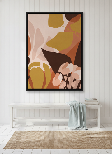 Oversized statement canvas wall art with a black surround styled on the wall in a coastal living room