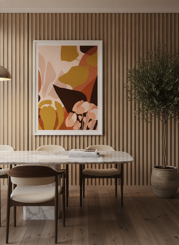 Modern wall art print styled on the wall in a luxe dining room