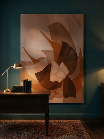 Stretched canvas wall art styled on the wall in a moody home office