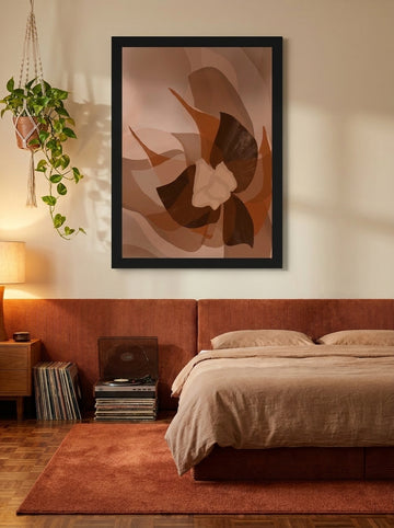 Oversized statement modern wall art print styled on the wall in a retro 70s bedroom