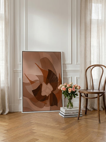 Canvas wall art with a white surround leaning against the wall in a Parisian bedroom