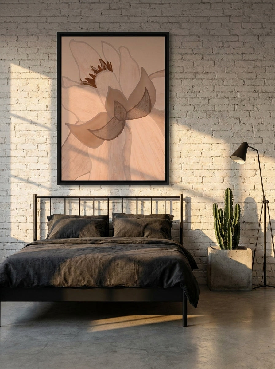 Canvas wall art with a black surround styled on the wall in an industrial loft bedroom