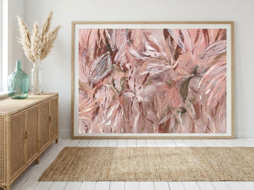 Modern wall art print standing on a sideboard in a coastal dining room