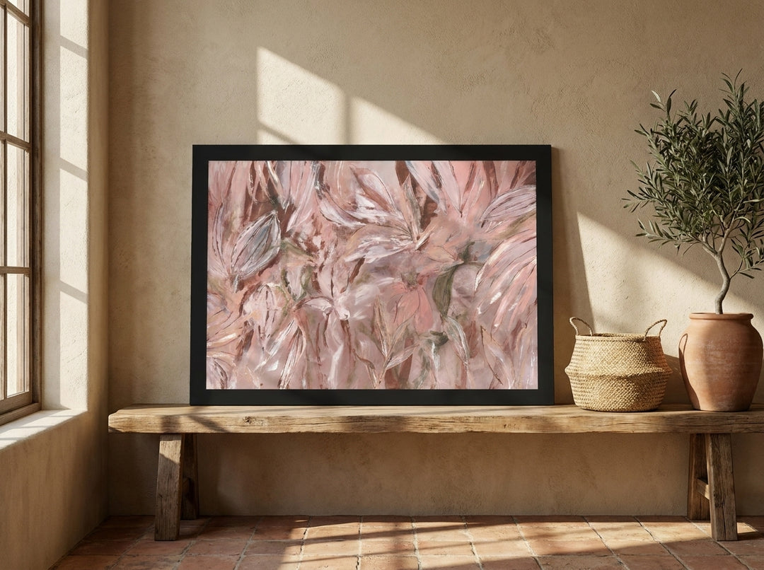 Modern wall art print standing on a bench in a Mediterranean bedroom