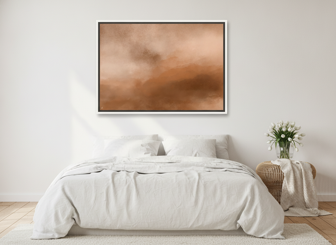 Canvas wall art with a white surround styled on the wall in a bright Scandinavian bedroom
