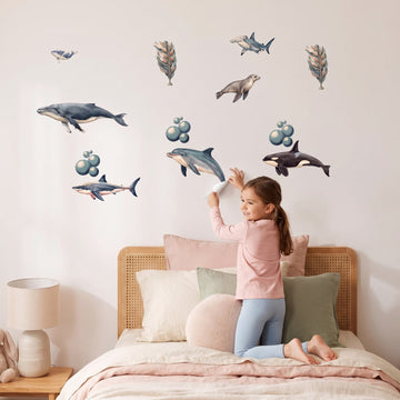 Under the Sea Wall Sticker Decals wall decals: a girl putting the decals up in a girl's bedroom