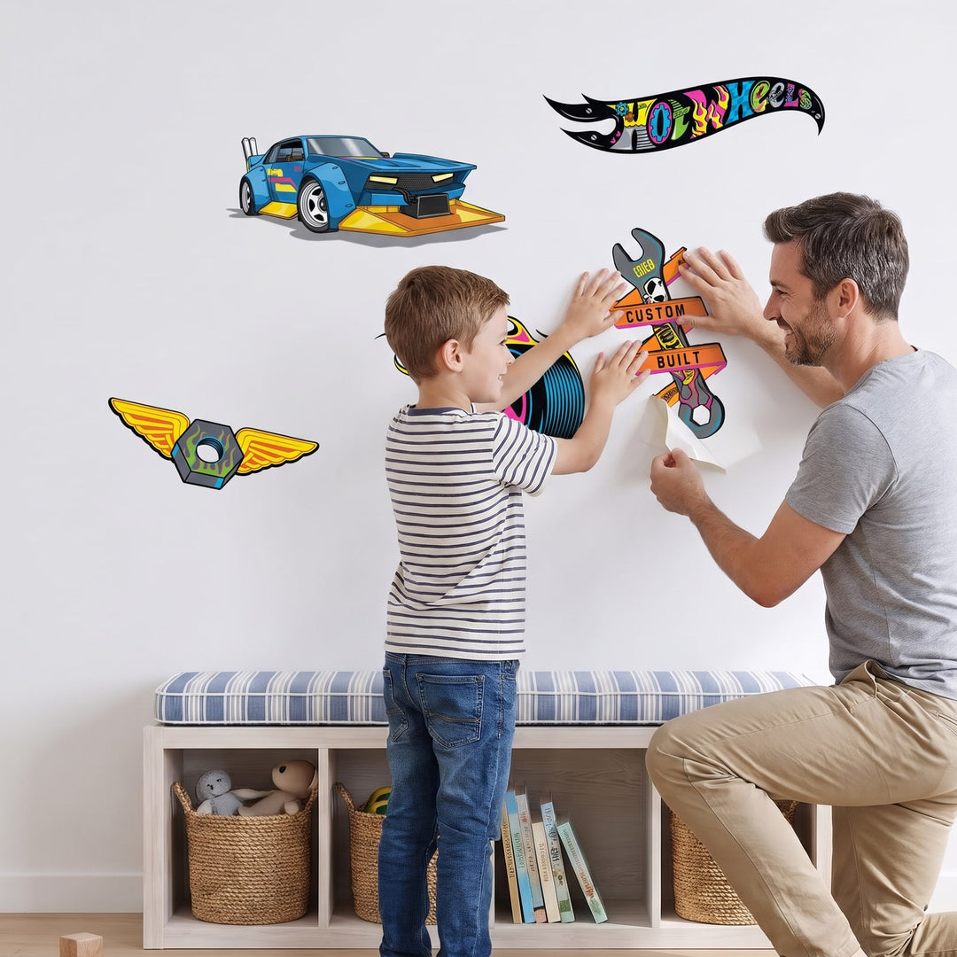 Hot Wheels Hot Rod Garage Set Wall Sticker Decals wall decals: a boy and his dad putting the decals up in a playroom