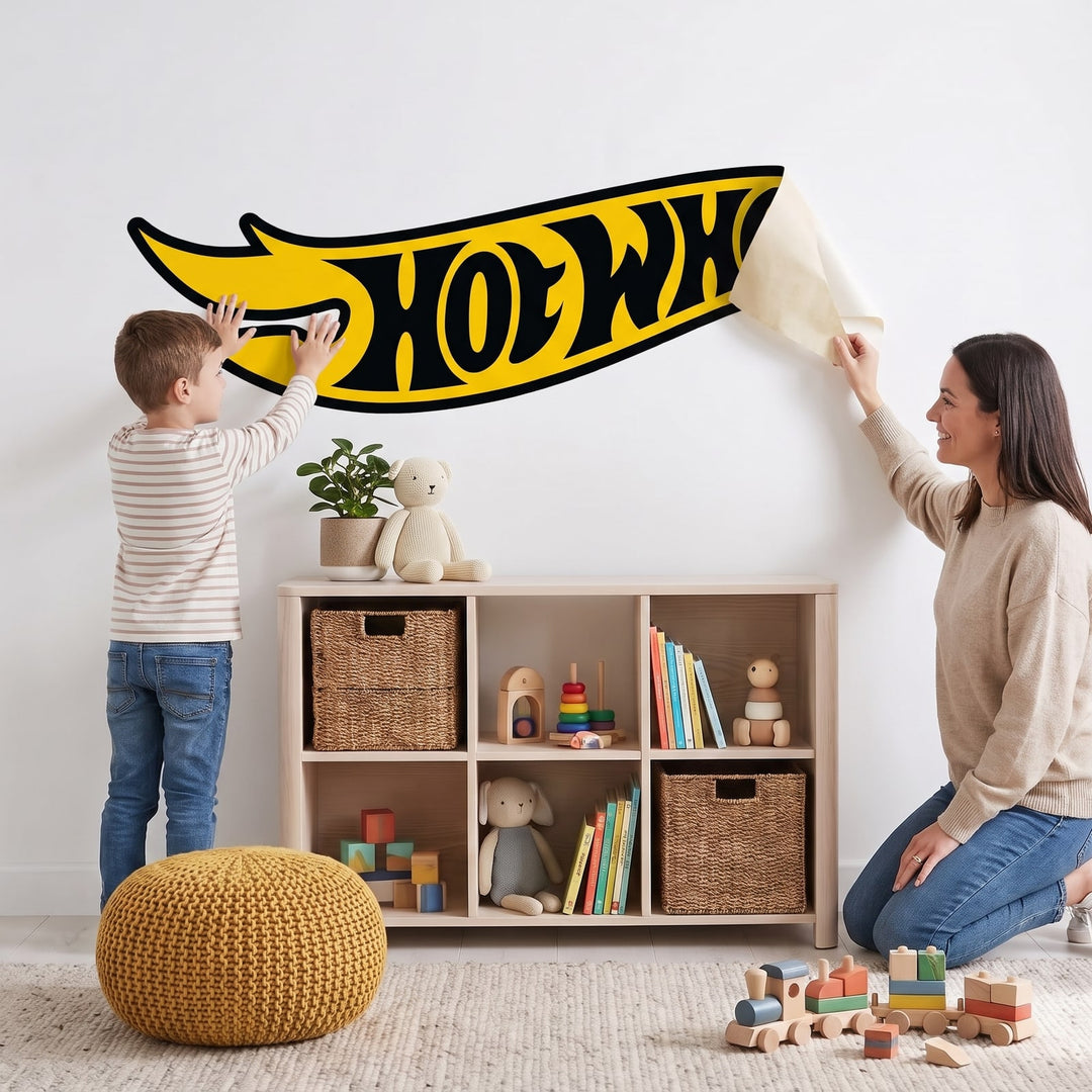 Hot Wheels Black & Yellow Logo Wall Sticker Decals wall decals: a boy and his mum putting the decals up in a kids' room