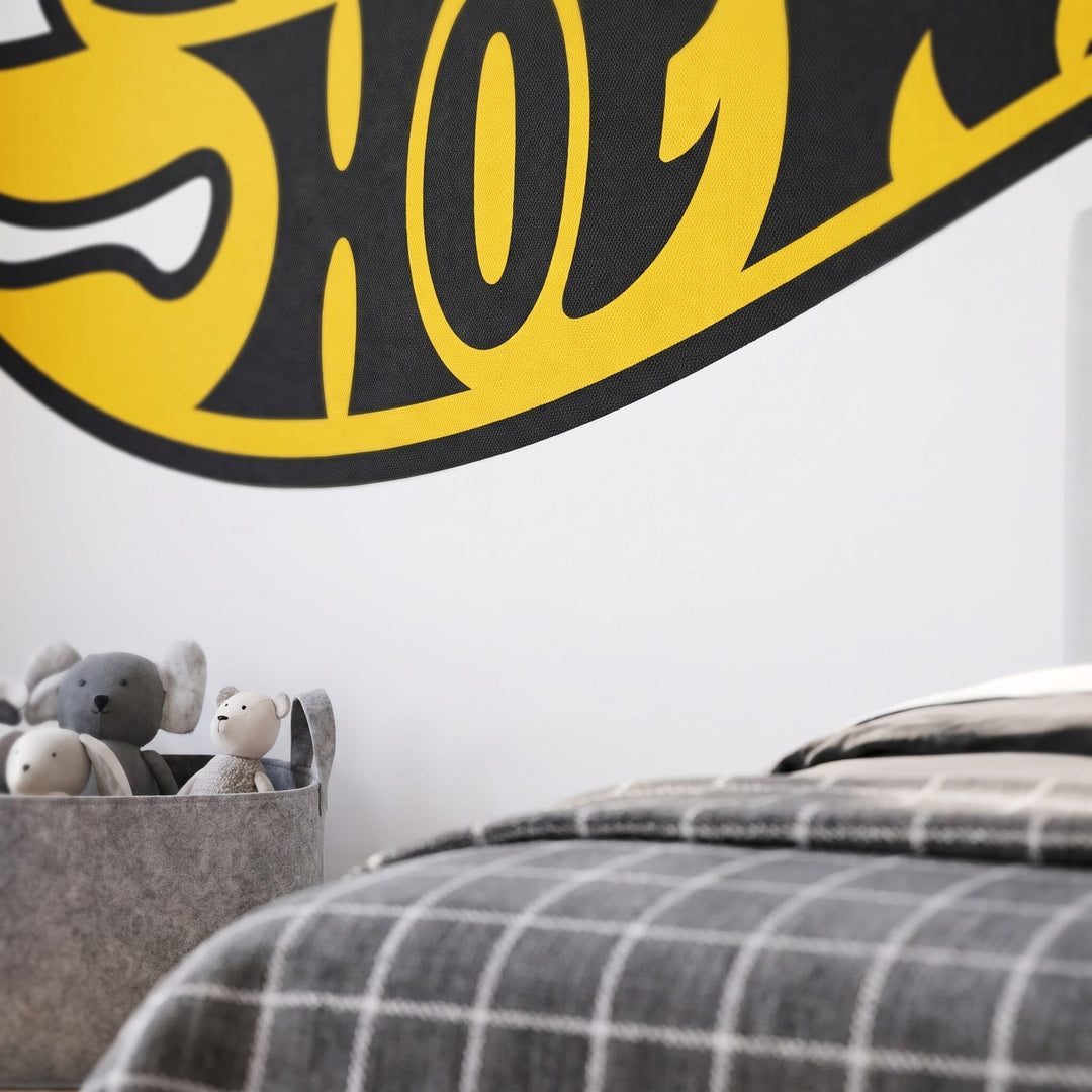 Hot Wheels Black & Yellow Logo Wall Sticker Decals wall decals: a close-up of the decals from one side in a boy's bedroom