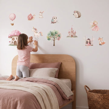 Fairy Land Wall Sticker Decals wall decals: a girl putting the decals up in a girl's bedroom